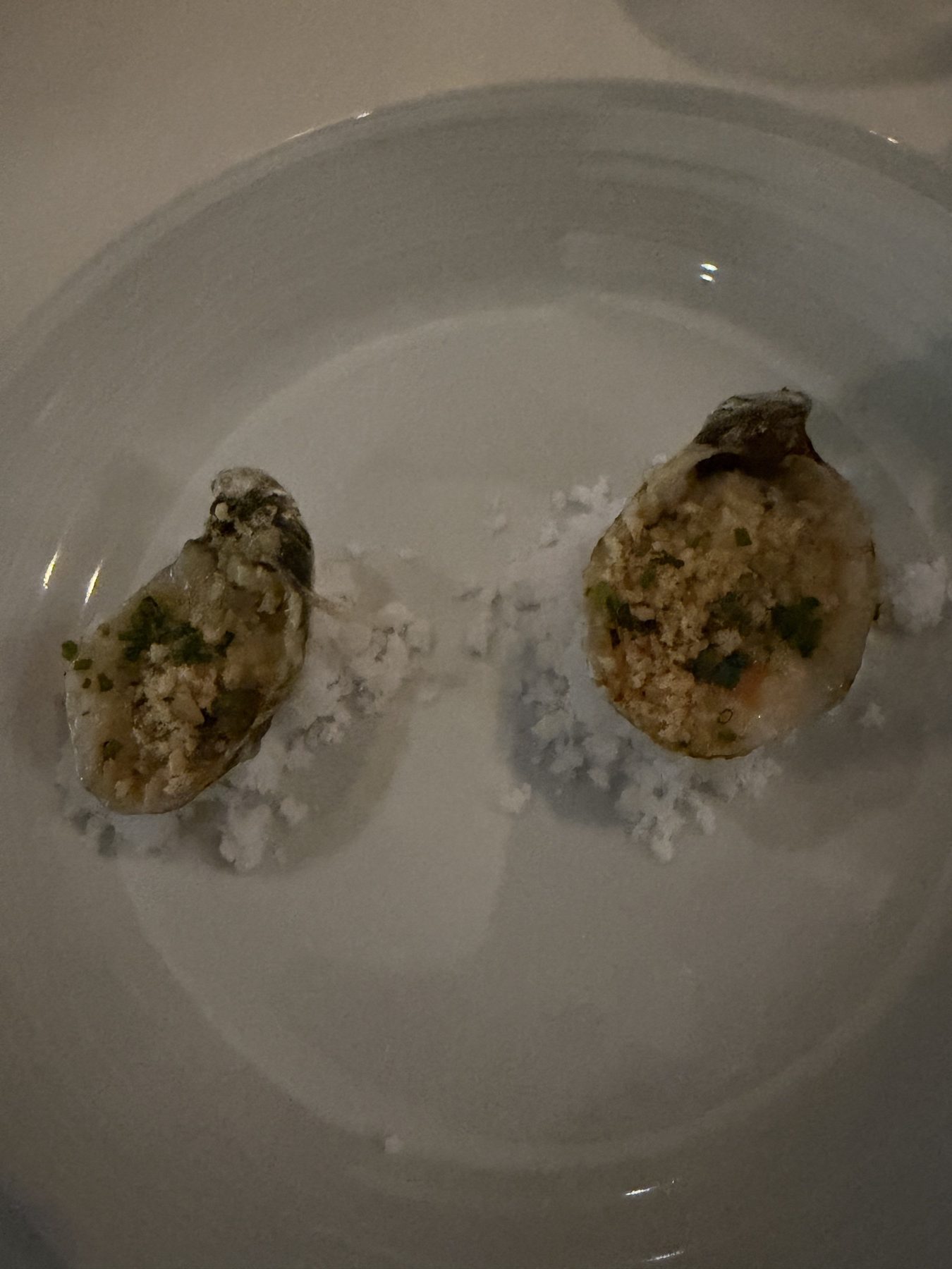 Two coal-fired Shigoku oysters with herbed crumbs
