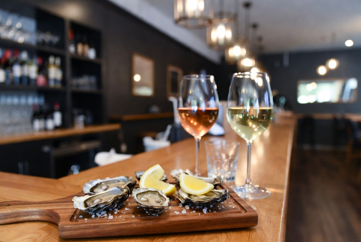 Fresh oysters and wine glasses at 58 Degrees